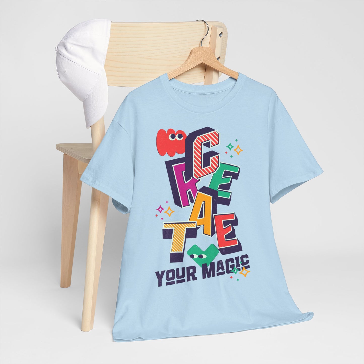T-shirt con scritta "Create your magic"