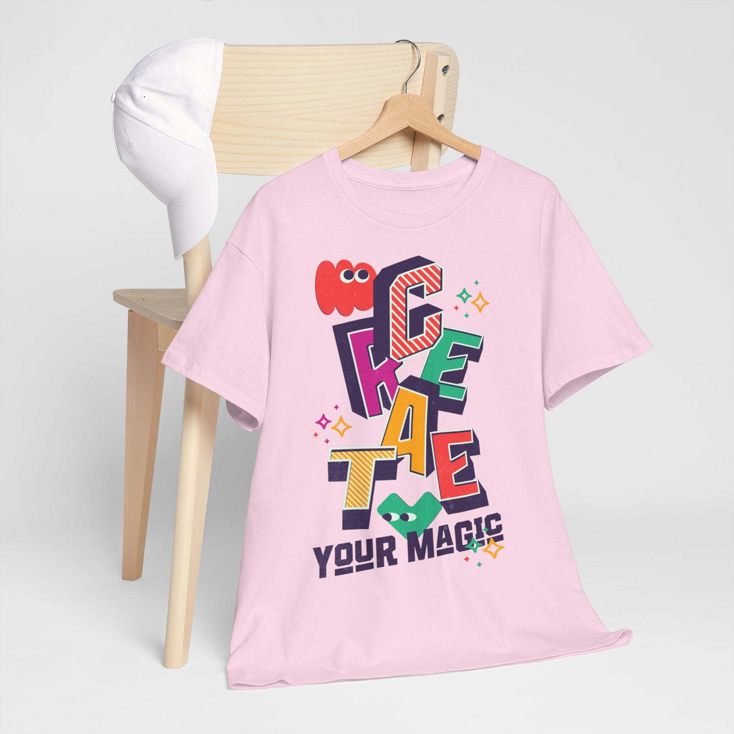 T-shirt con scritta "Create your magic"