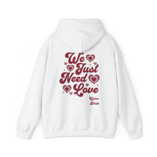 Felpa con scritta "We just need love"
